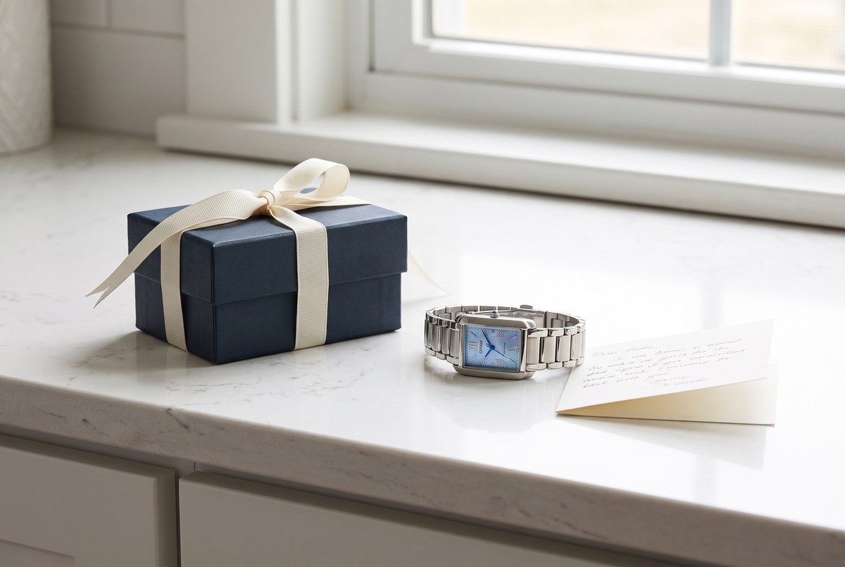 Navy gift box and Citizen L Bianca on a kitchen counter